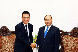 Thủ tướng Nguyễn Xuân Phúc tiếp ông Roongrote Rangsiyopash, Chủ tịch kiêm Tổng Giám đốc điều hành Tập đoàn SCG. (Ảnh: Thống Nhất/TTXVN)