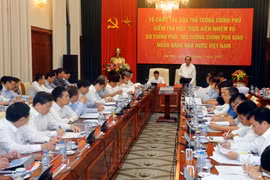 Tổ công tác của Thủ tướng làm việc với Ngân hàng Nhà nước Việt Nam. (Nguồn: TTXVN)