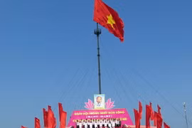 Quang cảnh Lễ Thượng cờ "Thống nhất non sông." (Ảnh: Trần Tĩnh/TTXVN)