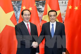 Chủ tịch nước Trần Đại Quang gặp Thủ tướng Trung Quốc Lý Khắc Cường. (Ảnh: Nhan Sáng/TTXVN) 