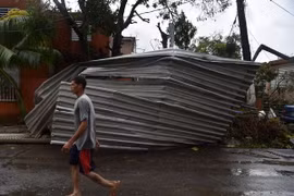 Cảnh đổ nát sau bão Maria tại San Juan, Puerto Rico ngày 20/9.(Nguồn: AFP/TTXVN)