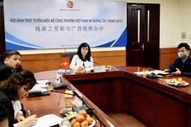 Lãnh đạo Vụ Thị trường châu Á-châu Phi hội đàm trực tuyến với Sở Công Thương Quảng Tây, Trung Quốc nhằm tháo gỡ tình trạng ùn tắc hàng hóa. (Ảnh: PV/Vietnam+)