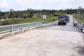 Đường giao thông nông thôn tại xã Tân Thành-Thành Đông, huyện Bình Tân, tỉnh Vĩnh Long. (Ảnh: Đình Huệ/TTXVN)