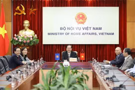Bộ trưởng Bộ Nội vụ Lê Vĩnh Tân chủ trì tại điểm cầu Hà Nội. (Ảnh: Văn Điệp/TTXVN)