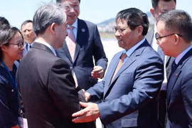 Lễ đón Thủ tướng Phạm Minh Chính đến thành phố Đại Liên, tỉnh Liêu Ninh (Trung Quốc). (Ảnh: Dương Giang/TTXVN)