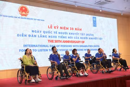Lễ kỷ niệm 30 năm Ngày Quốc tế về người khuyết tật (3/12). (Ảnh: Hoàng Hiếu/TTXVN)