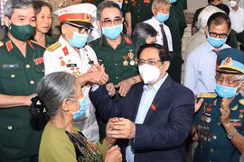 Thủ tướng Phạm Minh Chính gặp mặt, tri ân đại biểu người có công với cách mạng nhân kỷ niệm Ngày thương binh, liệt sỹ, hồi tháng 7/2021. (Ảnh: Dương Giang/TTXVN)