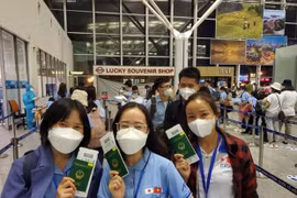Lao động Việt Nam lên đường đi làm việc ở Nhật Bản. (Ảnh: PV/Vietnam+)