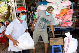 Xuất gạo dự trữ quốc gia để cứu trợ khẩn cấp cho người dân. (Ảnh minh hoạ: TTXVN)