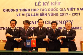 Lễ ký kết Chương trình hợp tác quốc gia Việt Nam-ILO về việc làm bền vững. (Ảnh: PV/Vietnam+)