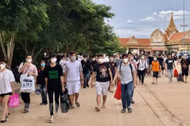 Bàn giao công dân Việt Nam bị lừa gạt, lôi kéo sang Campuchia làm việc dưới chiêu bài việc nhẹ, lương cao về nước. Ảnh minh họa. (Ảnh: TTXVN phát) 