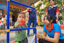 Ngày hội tạo nên sân chơi bổ ích giúp các em có khuyết tật trí tuệ, khuyết tật phát triển được thể hiện và phát huy tối đa khả năng của mình. (Ảnh: Mai Trang/TTXVN)