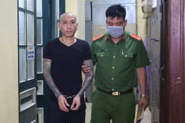 Phú Lê tại cơ quan điều tra.