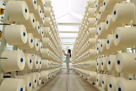 Dây chuyền sợi xuất khẩu tại Công ty TNHH dệt Phú Thọ. (Ảnh: TTXVN)