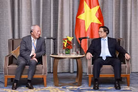 Thủ tướng Phạm Minh Chính tiếp ông Nghiêm Giới Hòa, Nhà sáng lập Tập đoàn Xây dựng Thái Bình Dương. (Ảnh: Dương Giang/TTXVN)