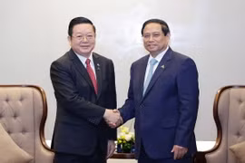 Thủ tướng Phạm Minh Chính tiếp Tổng Thư ký ASEAN Kao Kim Hourn. (Ảnh: Dương Giang/TTXVN)