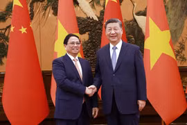 Thủ tướng Phạm Minh Chính hội kiến Tổng Bí thư, Chủ tịch nước Trung Quốc Tập Cận Bình. (Ảnh: Dương Giang/TTXVN)