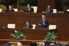 Bộ trưởng Bộ Tài Chính Hồ Đức Phớc giải trình, làm rõ một số vấn đề đại biểu Quốc hội nêu. (Ảnh: An Đăng/TTXVN)