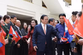 Thủ tướng Phạm Minh Chính và Phu nhân gặp gỡ cán bộ, nhân viên các cơ quan đại diện và cộng đồng người Việt Nam tại Australia. (Ảnh: Dương Giang/TTXVN)