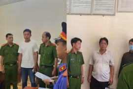 Cơ quan Cảnh sát điều tra, Công an tỉnh Kiên Giang thi hành lệnh bắt bị can Nguyễn Văn Tiền (trái) và Đặng Minh Dương (phải) để điều tra về hành vi lừa đảo chiếm đoạt tài sản. (Ảnh: TTXVN phát)