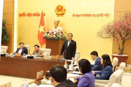 Ủy ban Thường vụ Quốc hội thông qua Nghị quyết. (Ảnh: Nhan Sáng/TTXVN)