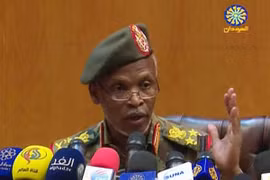 Ông Omar Zeinalabdin phát biểu tại một cuộc họp báo vào ngày 12/4, tại thủ đô Khartoum. (Nguồn: AFP)