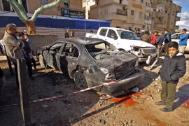 Hiện trường một vụ đánh bom ở Libya. (Nguồn: AFP/TTXVN)