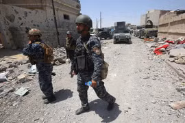 Lực lượng Iraq tuần tra tại Mosul ngày 17/6. (Nguồn: AFP/TTXVN)