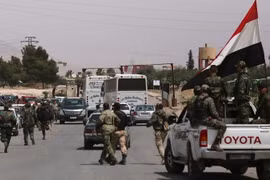 Các lực lượng Syria tăng cường an ninh tại Damacus ngày 9/4. (Nguồn: AFP/TTXVN)