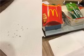 Suất ăn có giun của McDonald. (Nguồn: Facebook Qiqi)