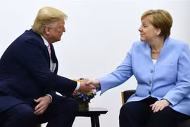 Tổng thống Mỹ Donald Trump (trái) và Thủ tướng Đức Angela Merkel (phải) tại cuộc hội đàm bên lề Hội nghị thượng đỉnh G20 ở Osaka, Nhật Bản ngày 28/6/2019. (Nguồn: AFP/TTXVN) 