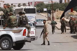 Các lực lượng Syria tăng cường an ninh tại Damacus ngày 9/4. (Nguồn: AFP/TTXVN)