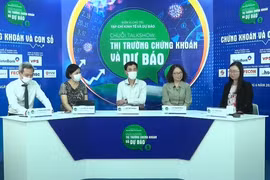 Tọa đàm “Thị trường chứng khoán và dự báo,” ngày 28/6. (Ảnh: Vietnam+)
