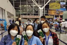 Lao động Việt Nam lên đường đi làm việc ở Nhật Bản. (Ảnh: PV/Vietnam+)