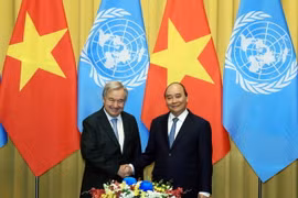 Chủ tịch nước Nguyễn Xuân Phúc và Tổng Thư ký Liên hợp quốc António Guterres. (Ảnh: Thống Nhất/TTXVN)