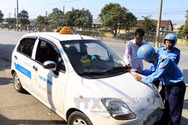 Thanh tra hoạt động taxi tại Hà Nội. Ảnh minh họa. (Ảnh: Thế Duyệt/TTXVN)