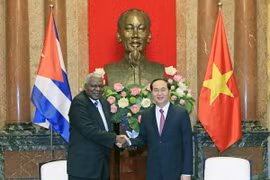 Chủ tịch nước Trần Đại Quang tiếp đồng chí Esteban Lazo Hernandes, Ủy viên Bộ Chính trị, Chủ tịch Quốc hội Cộng hòa Cuba đang có chuyến thăm chính thức Việt Nam. (Ảnh: Nhan Sáng/TTXVN)