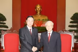 Tổng Bí thư Nguyễn Phú Trọng tiếp Ủy viên Bộ Chính trị, Bí thư Ban Bí thư, Trưởng ban Tuyên truyền Trung ương Lưu Kỳ Bảo dẫn đầu Đoàn đại biểu Đảng Cộng sản Trung Quốc sang thăm và tham dự Hội thảo Lý luận giữa hai Đảng lần thứ 12. (Ảnh: Trí Dũng/TTXVN)