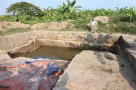 Hố thám sát của các nhà khảo cổ khai quật nghiên cứu khảo cổ học cụm di chỉ Vườn Chuối năm 2019. (Ảnh: Mạnh Khánh/TTXVN)