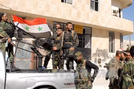 Binh sĩ chính phủ Syria trung thành với ông Al-Assad (Nguồn: AFP/TTXVN)