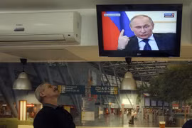 Putin nhất trí giải quyết khủng hoảng Ukraine trong hòa bình