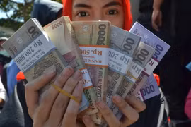 Đồng rupiah của Indonesia. (Nguồn: AFP/TTXVN)