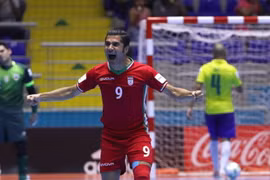 Afshin Kazemi ăn mừng sau khi ghi bàn vào lưới Brazil. (Nguồn: Getty Images)