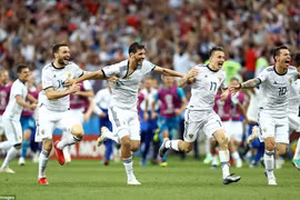 Niềm vui của cầu thủ Nga sau khi đánh bại Tây Ban Nha. (Nguồn: Getty Images)