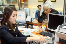 Sacombank triển khai gói tài khoản an sinh xã hội miễn phí. (Ảnh: Vietnam+)