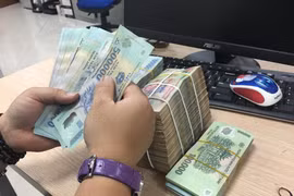 Ngân hàng Nhà nước chỉ đạo hỗ trợ khách hàng bị ảnh hưởng bởi bão số 3. (Ảnh: Vietnam+)