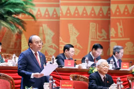 Ủy viên Bộ Chính trị, Thủ tướng Chính phủ Nguyễn Xuân Phúc thay mặt Đoàn Chủ tịch điều hành Đại hội. (Ảnh: TTXVN)