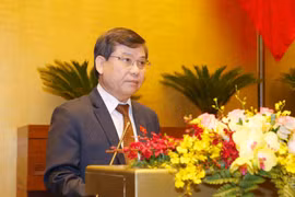Viện trưởng Viện Kiểm sát Nhân dân Tối cao Lê Minh Trí trình bày Báo cáo công tác nhiệm kỳ 2016-2021 của Viện Kiểm sát Nhân dân Tối cao. (Ảnh: Doãn Tấn/TTXVN)