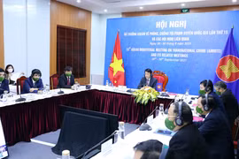 Trung tướng Lương Tam Quang, Thứ trưởng Bộ Công an tham dự Phiên họp toàn thể Hội nghị Bộ trưởng ASEAN về phòng, chống tội phạm xuyên quốc gia lần thứ 15 (AMMTC 15) và các hội nghị liên quan theo hình thức trực tuyến. (Ảnh: Phạm Kiên/TTXVN)
