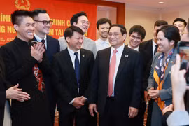 Thủ tướng Phạm Minh Chính với cộng đồng người Việt Nam tại Nhật Bản. (Ảnh: Dương Giang/TTXVN)
